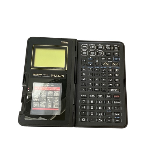 Sharp OZ-7200 Wizard Electronic Organizer 64KB W/ Protection Card Untested - Picture 4 of 9